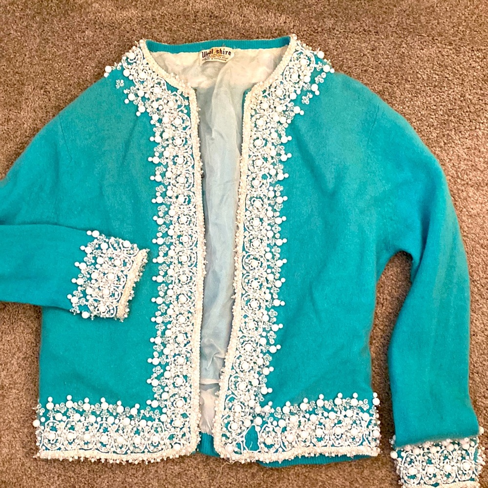 An antique (1940s) lambs wool beaded sweater size M